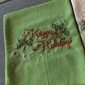 Happy Holiday Hand Embroidered Towel Red White Green color scheme on Green Towel